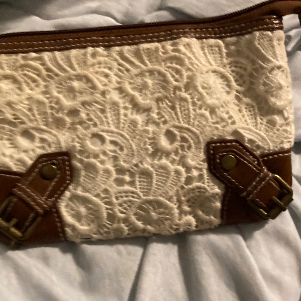 Small white and brown wallet